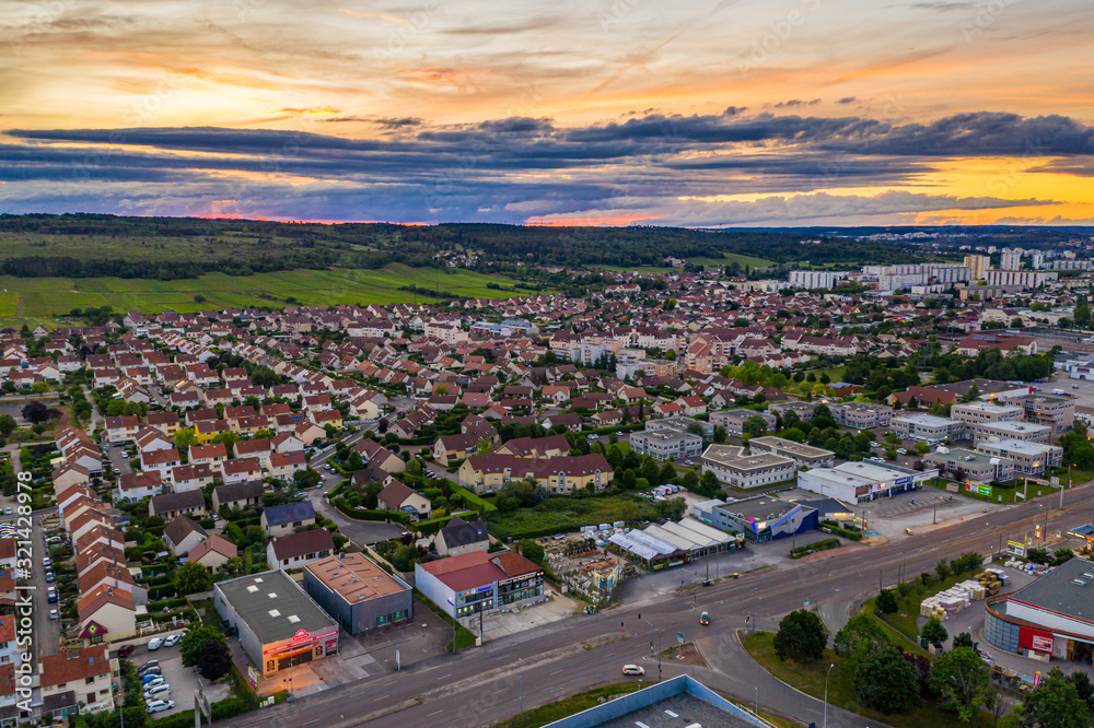 Aerial townscape scenery of Dijon city with beautiful sunset sky