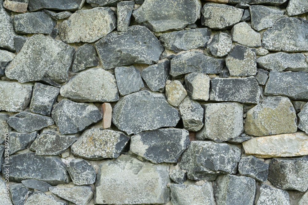 A wall of old stones A wall of old stones