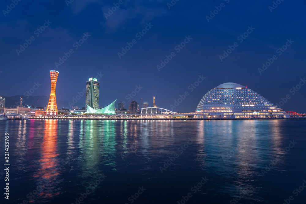 Kobe / Japan - JANUARY 4, 2020: Kobe Japan - Circa Static wide of the famous red Kobe Port Tower at night light. Kobe - Japan