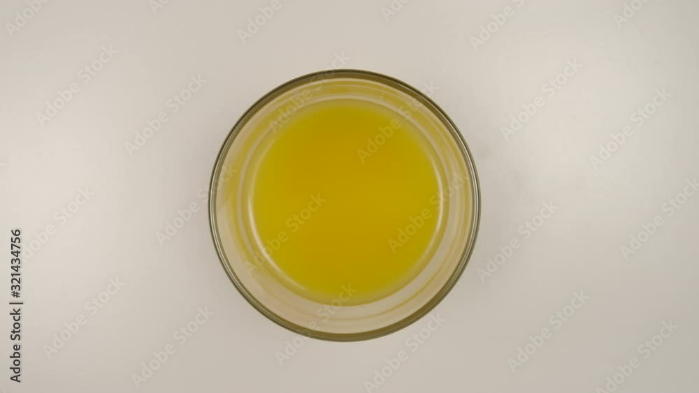 TOP VIEW: Fresh orange juice Drinking from a glass - Stop motion TOP VIEW: Fresh orange juice Drinking from a glass - Stop motion