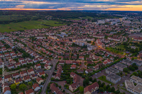 High angle aerial townscape view of Dijon city at sunset