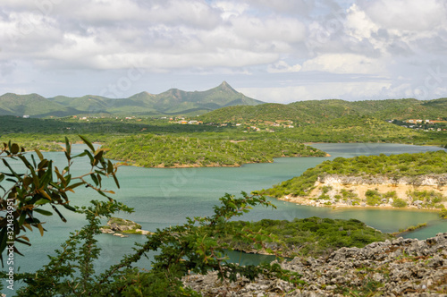 View over Santa Martha Bay in Curacao with Mount Christoffel in the background photo