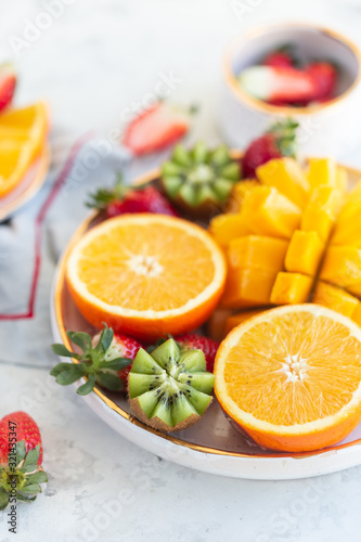 A bowl of fresh juicy fruit 