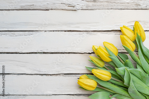 Springtime flowers. Colorful tulips on rustic wooden background. Springtime, Mother's day, Valentine's Day, Easter concept.
