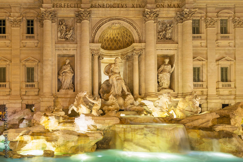 Beautiful architecture of the Trevi Fountain in Rome at night, Italy