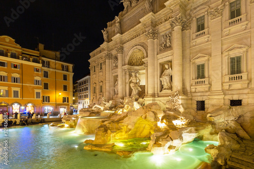 Beautiful architecture of the Trevi Fountain in Rome at night, Italy