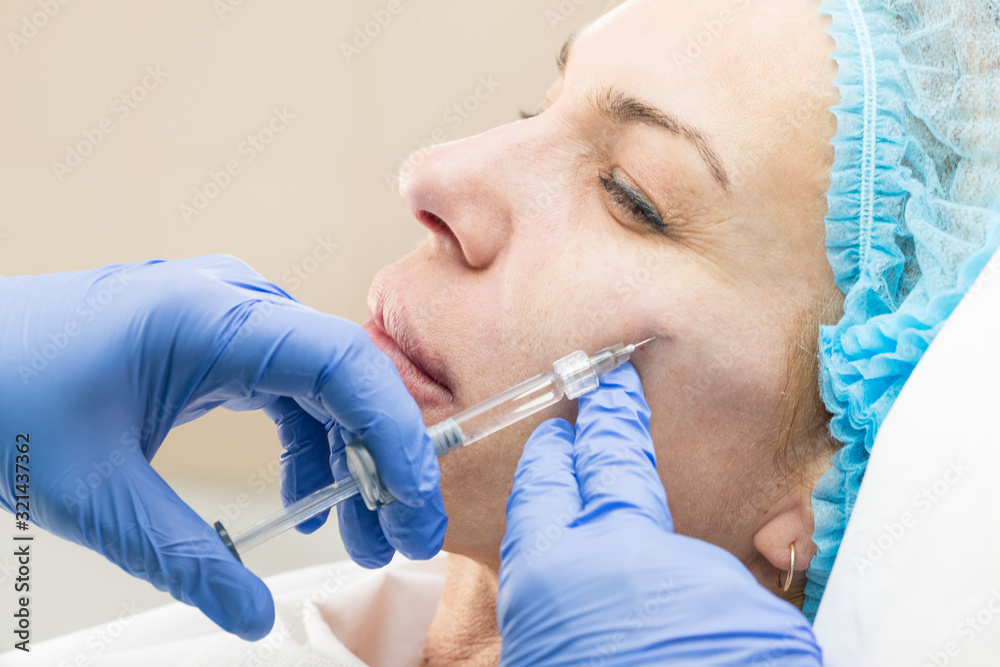 The procedure of therapeutic injections to rejuvenate the skin and smooth wrinkles. The procedure of therapeutic injections to rejuvenate the skin and smooth wrinkles.