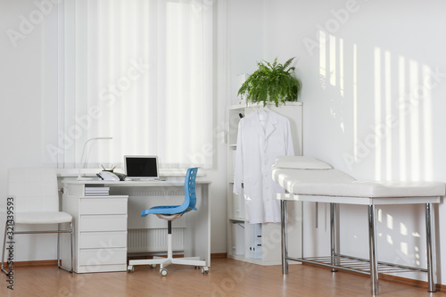 Interior of modern medical office with doctor s workplace