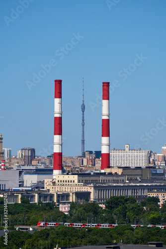 industrial factory with smoking chimneys