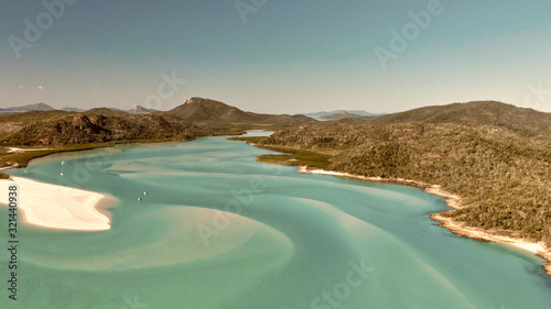 Amazing aerial view of Tropical Beach with forest and mountains