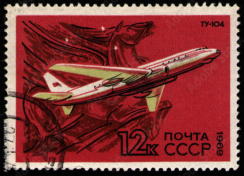 USSR - CIRCA 1969: post stamp 12 Soviet kopek printed by USSR, shows Tupolev Tu-104 (NATO reporting name: Camel), twinjet medium-range narrow-body turbojet-powered Soviet airliner, circa 1969