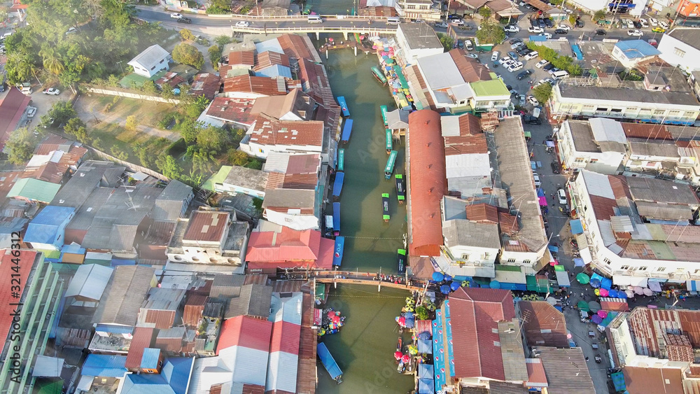 Overhead aerial view of Amphawa Market at sunset, famous floating market near Bangkok, Thailand Overhead aerial view of Amphawa Market at sunset, famous floating market near Bangkok, Thailand