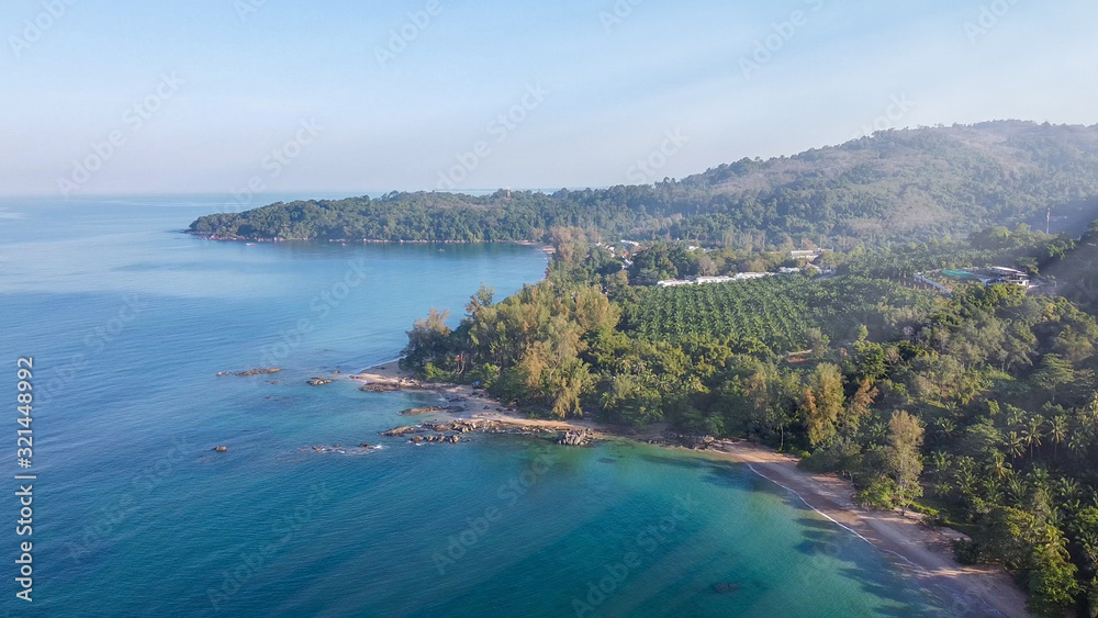 Forest and tropical sea, amazing aerial view from drone. Holiday concept