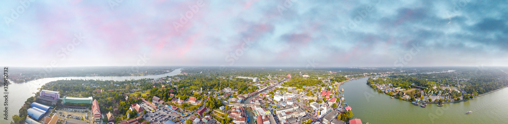 Panoramic aerial view of Amphawa Market at sunset, famous floating market near Bangkok, Thailand