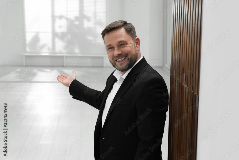 Male real estate agent showing new apartment Male real estate agent showing new apartment