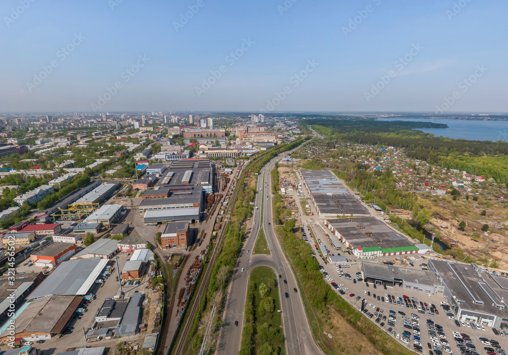 Fototapeta Industrial area, gardens and Shartash lake in Yekaterinburg city, Russia. Aerial, summer, sunny
