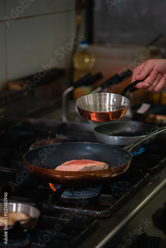 Fresh salmon in a frying pan