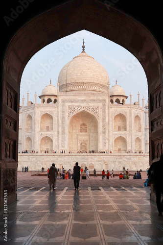 people standing at the gate facing Taj Mahal, Agra, India.