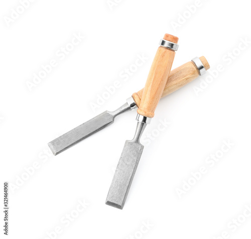 Modern chisels isolated on white. Carpenter's tools photo