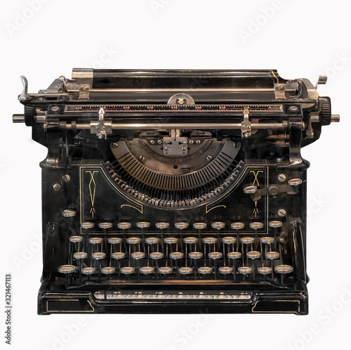 Vintage typewriter isolated on white background.