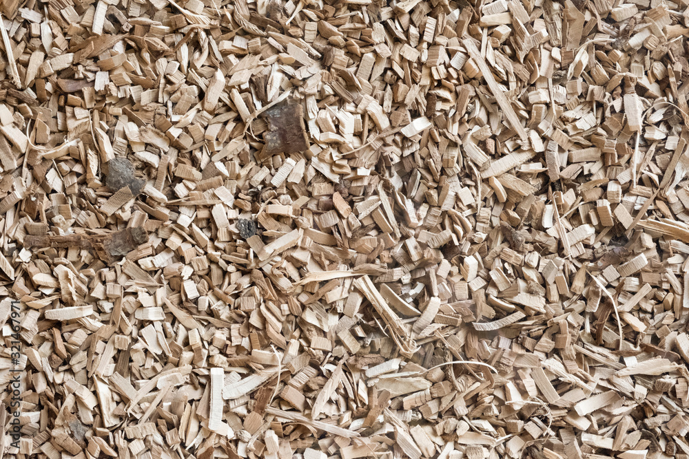Wood chips, sawdust pile. Biofuel component. Biomass energy.