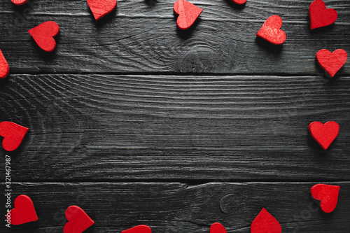 Bild auf Leinwand Valentines Day frame of wooden heart decorations