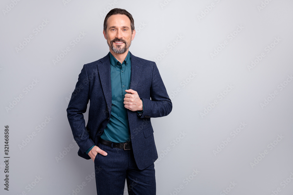 Portrait of his he nice attractive cheerful content middle age man in old-fashioned formalwear suit PR director leader expert isolated over light white gray pastel color background Portrait of his he nice attractive cheerful content middle age man in old-fashioned formalwear suit PR director leader expert isolated over light white gray pastel color background
