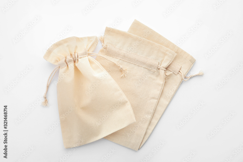 Cotton eco bags isolated on white, top view