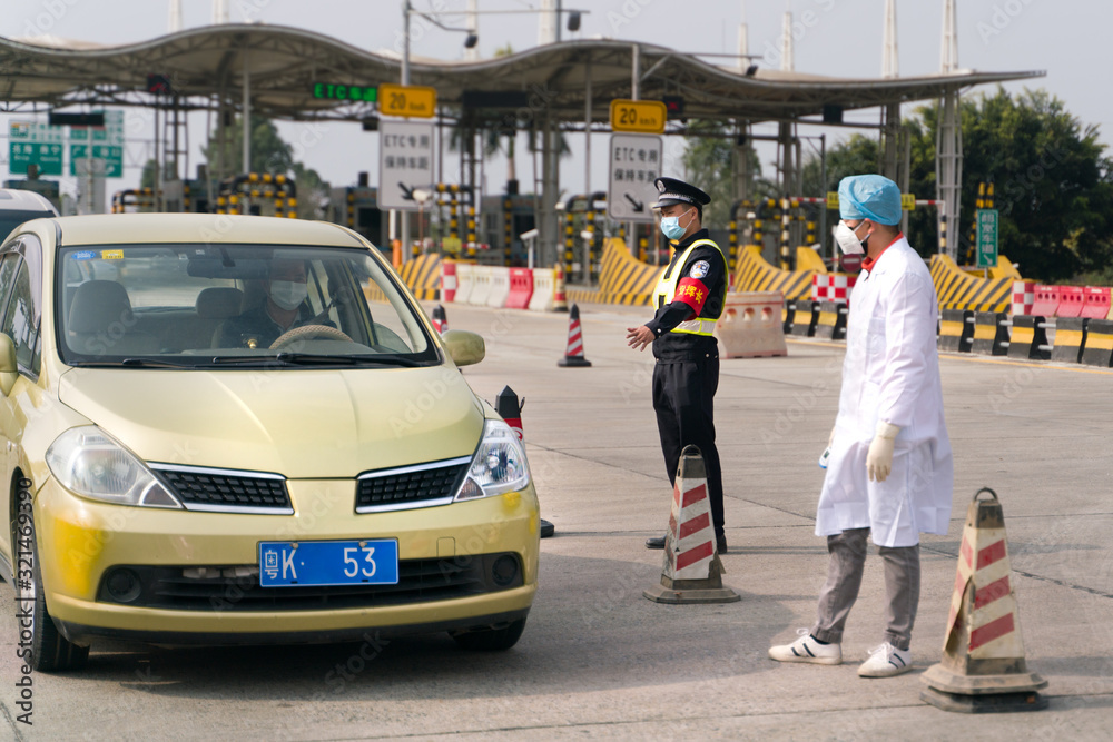 The coronavirus check post on highway. Doctors checking body temperature. The coronavirus check post on highway. Doctors checking body temperature.
