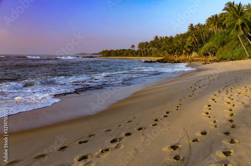 beach and sea. Sea sunset and empty beach.  Footprints in the sand on the beach.  Empty beach and ocean.
