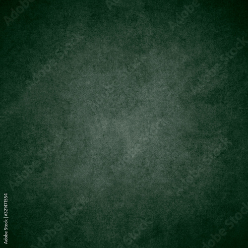 Green designed grunge texture. Vintage background with space for text or image