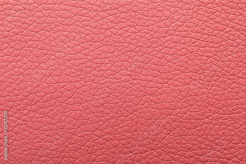 Texture of pink leather as background, closeup
