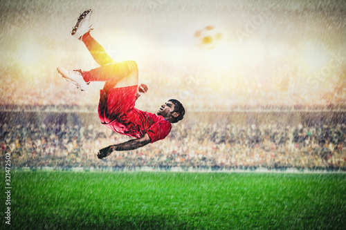 Overhead kick by red player action in the stadium