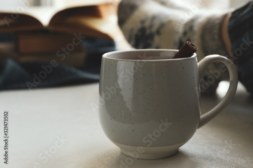 Cup of delicious mulled wine indoors. Winter drink