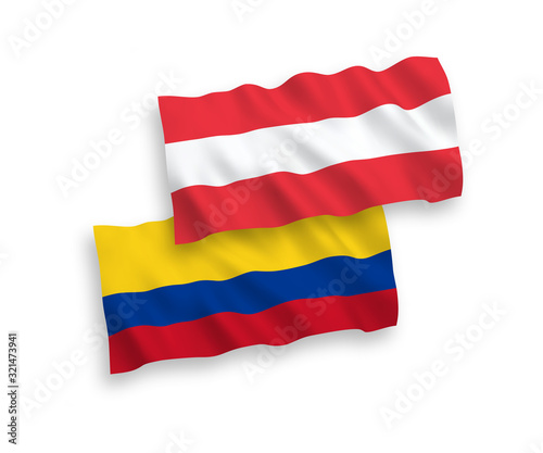 National vector fabric wave flags of Austria and Colombia isolated on white background. 1 to 2 proportion.