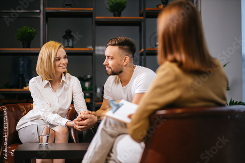 family concept. cute caucasian couple visit professional family psychologist every month, expert help them to overcome difficulties in relationships and discuss issues of the day
