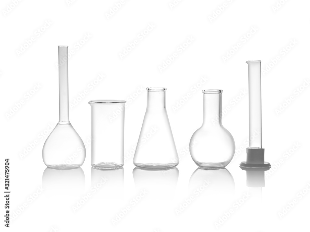 Clean empty laboratory glassware isolated on white Clean empty laboratory glassware isolated on white