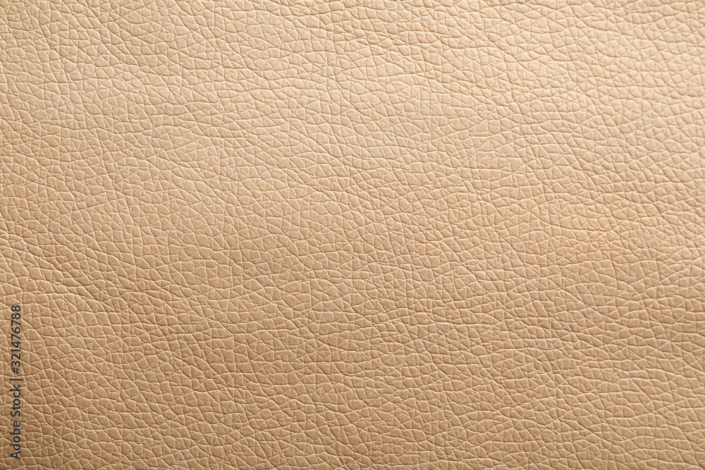 Texture of beige leather as background, closeup Texture of beige leather as background, closeup