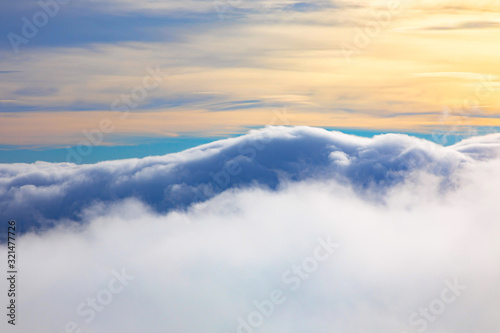 Fototapeta Naklejka Na Ścianę i Meble -  view over the clouds, land of heaven