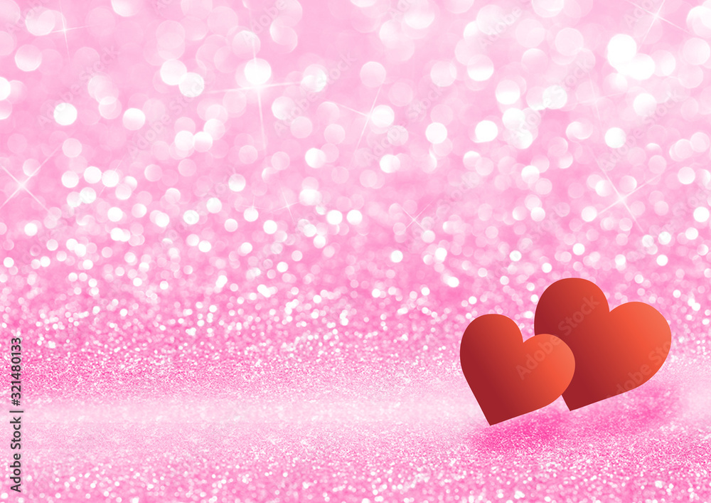 Pink texture background with glittering sparkles and two red  hearts. Festive glitter background.