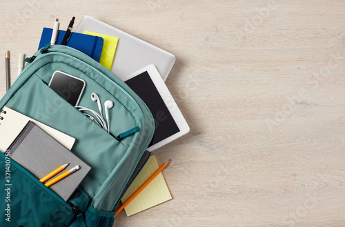 Backpack and office supplies photo
