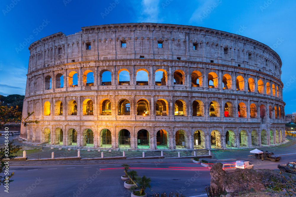 The Colosseum illuminated at night in Rome, Italy