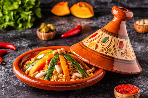 Vegetable tagine with almond and chickpea couscous. photo