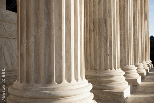 Columns of the US Supreme Court in Washington DC daytime photo
