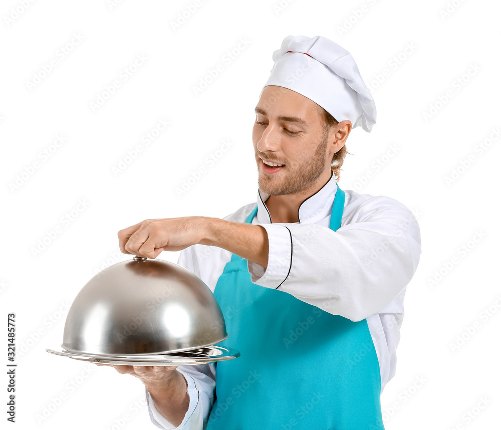 Handsome male chef with tray and cloche on white background Handsome male chef with tray and cloche on white background