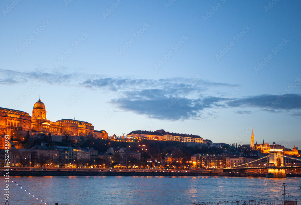Budapest Castle at sunset from danube river