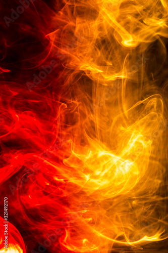 Colored smoke on black background