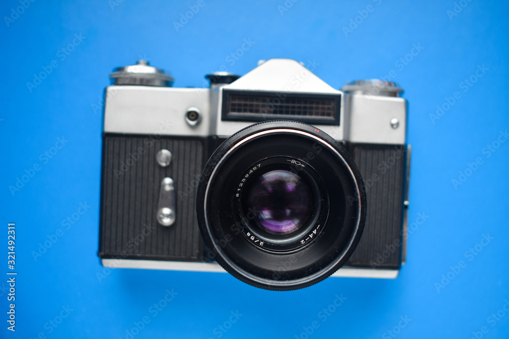  old camera on a blue background