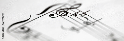 Fototapeta Musical notes printed on paper sheet