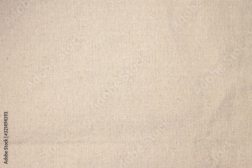 Beige linen fabric cotton for wallpaper design.